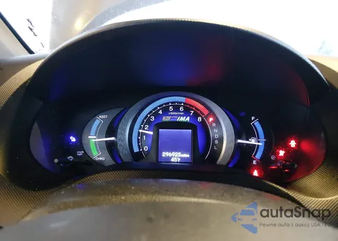 2011 Honda Insight from USA, damaged, VIN JHMZE2H32BS001076